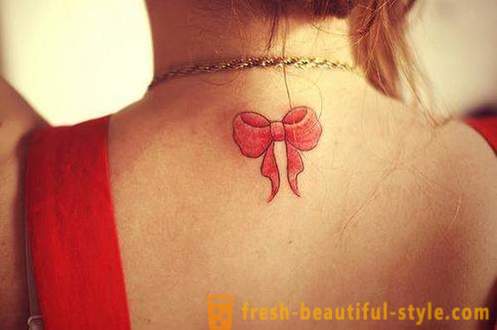 Vakre kvinnelige tatovering - som hogge og hvor det er et bilde